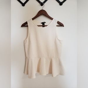 Cream, peplum top.